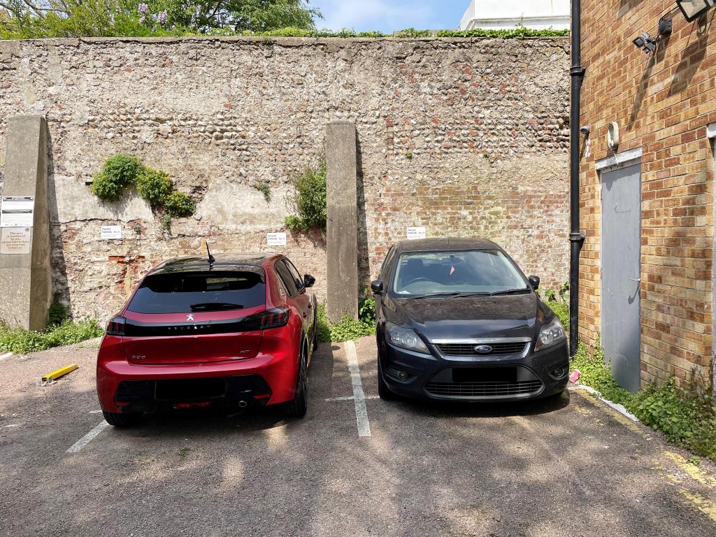 Lot: 135 - TWO PARKING SPACES IN CITY CENTRE - two car spaces in walled compound
